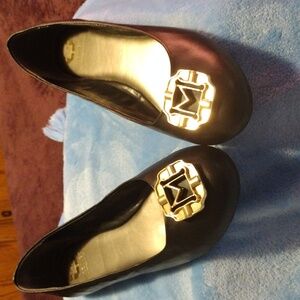 Monet Black Flats with Gold Emblem